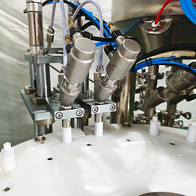 Kleine Dosis 10 ml Pneumatische 2-köpfige Füll- und Schraubverschlussmaschine für flüssiges Ölgel