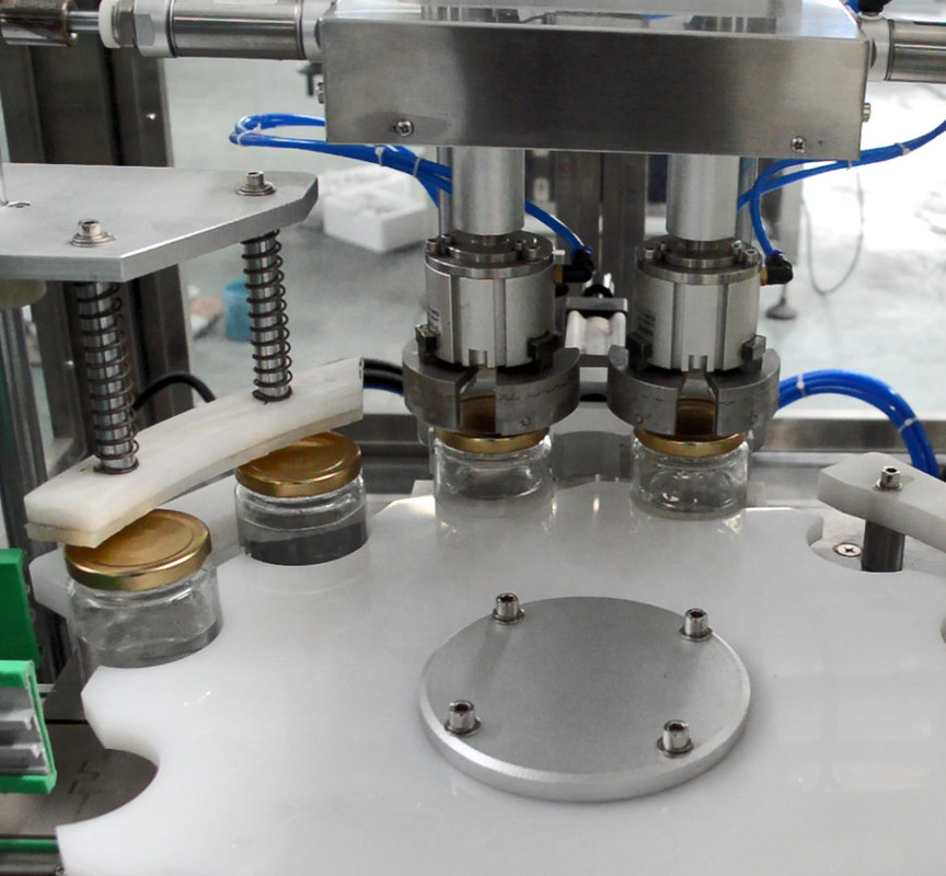 Lieferung Verkauf komplette automatische Verkleidungsmaschine für Wein/Liter/Spirituosen Guan Hong